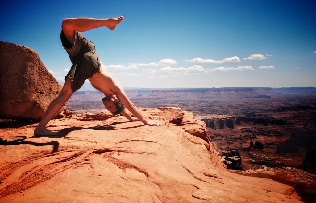 yoga over The Grand View Point in Canyonlands NP