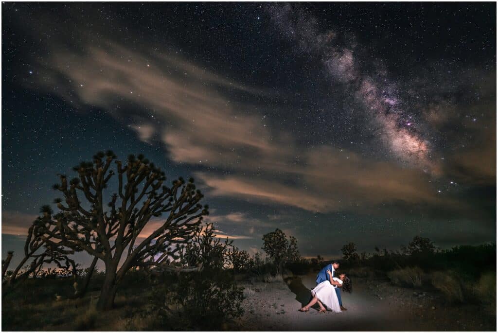 Couple beneath the Milky Way in Nevada Wee Thump Joshua Tree Wilderness